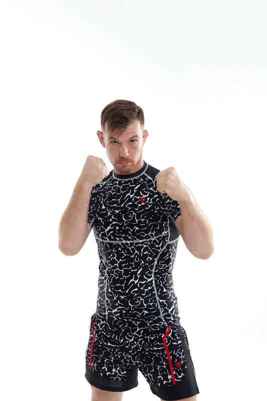 Model is 180cm/82kgs (5’9-189lbs) | Rashguard's size M